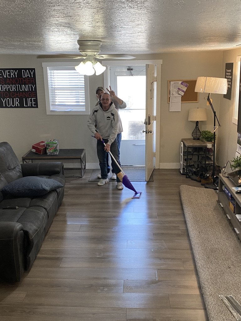 Residents doing house chores together